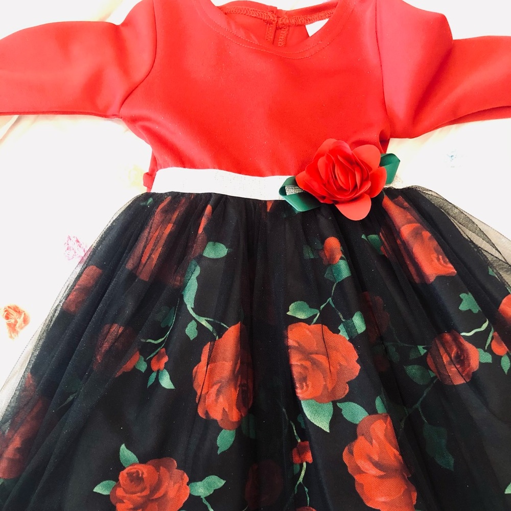 Beautiful red and black Christmas dress. Size 4T. Only worn once.